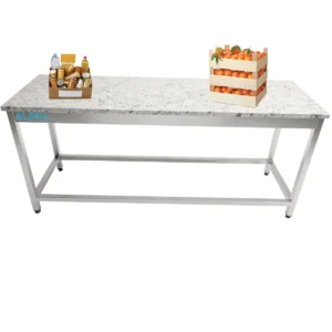 Commercial stainless steel work table with a thick marble top and open braced base for bakeries.