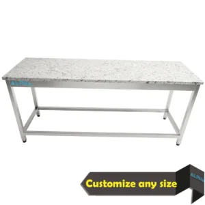 Commercial stainless steel work table with a thick marble top and open braced base for bakeries.